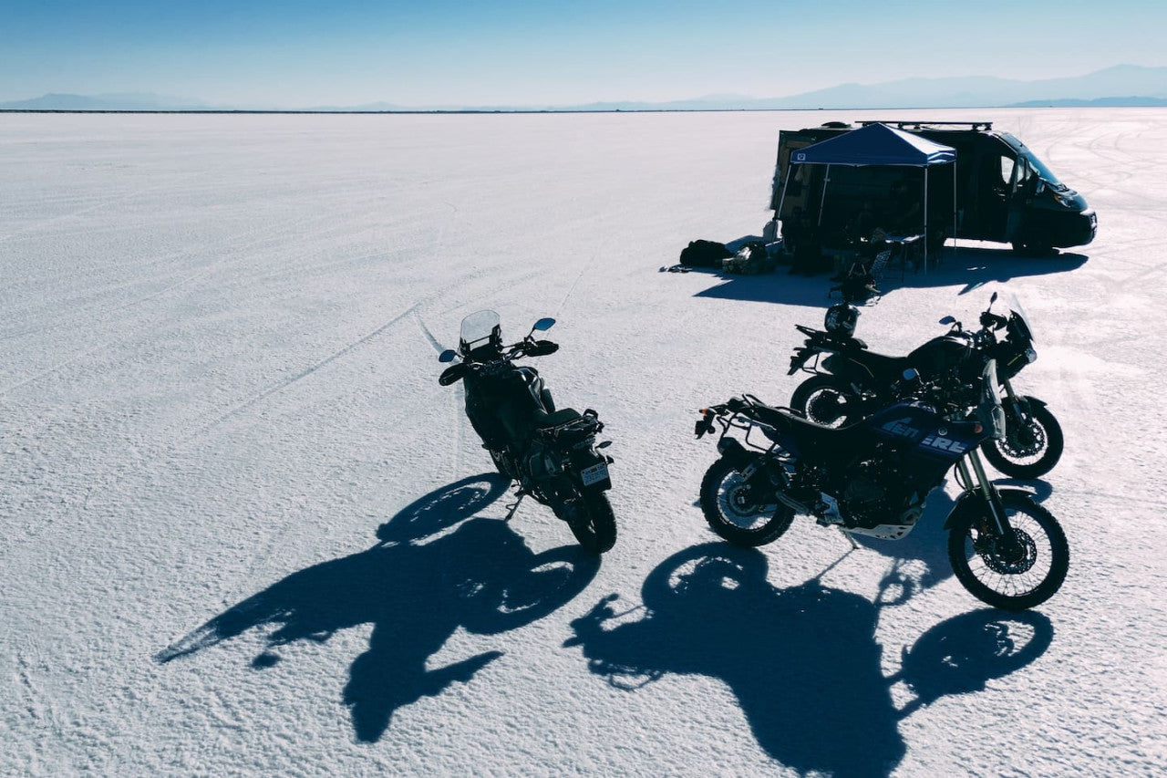 Scenic view in snow with sombra rv camper van rental in billings montana with three big bikes